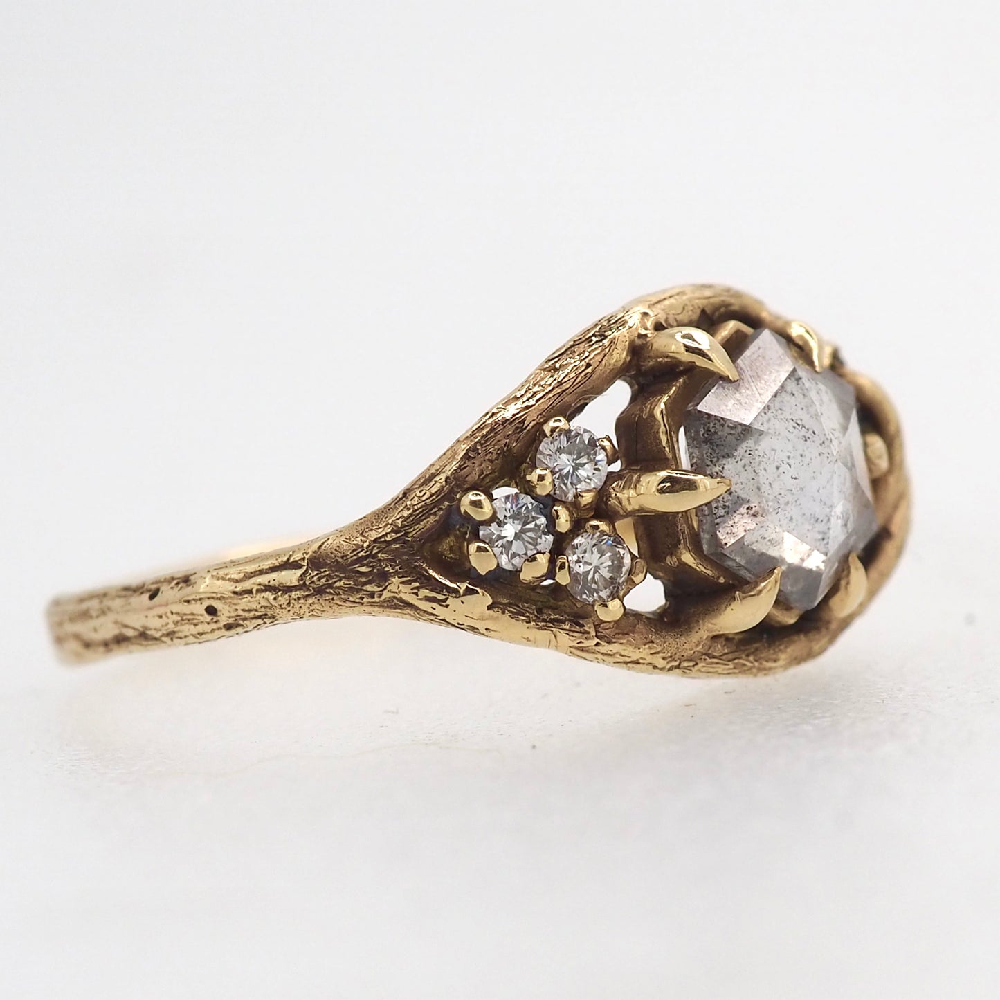 Caldera ring with salt and pepper diamond