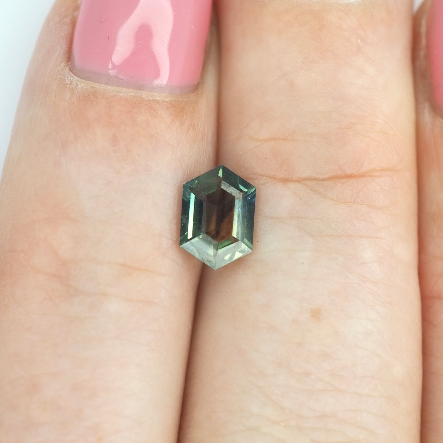 Green Australian sapphire emerald cut .81ct