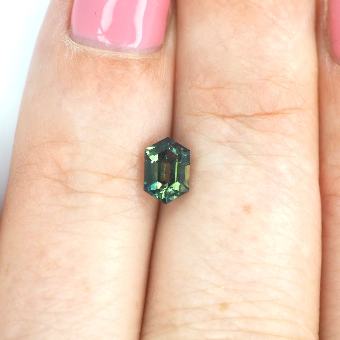 Green Australian sapphire emerald cut .79ct
