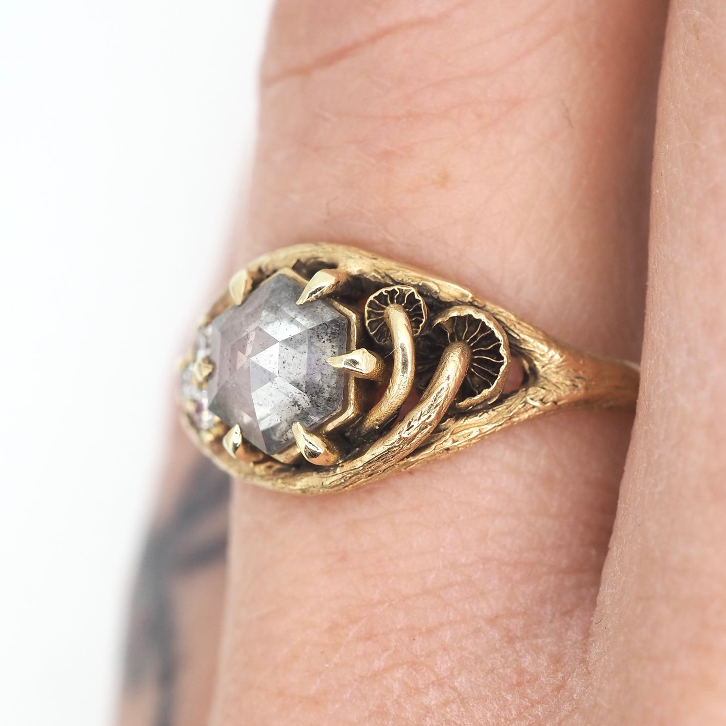 Caldera ring with salt and pepper diamond
