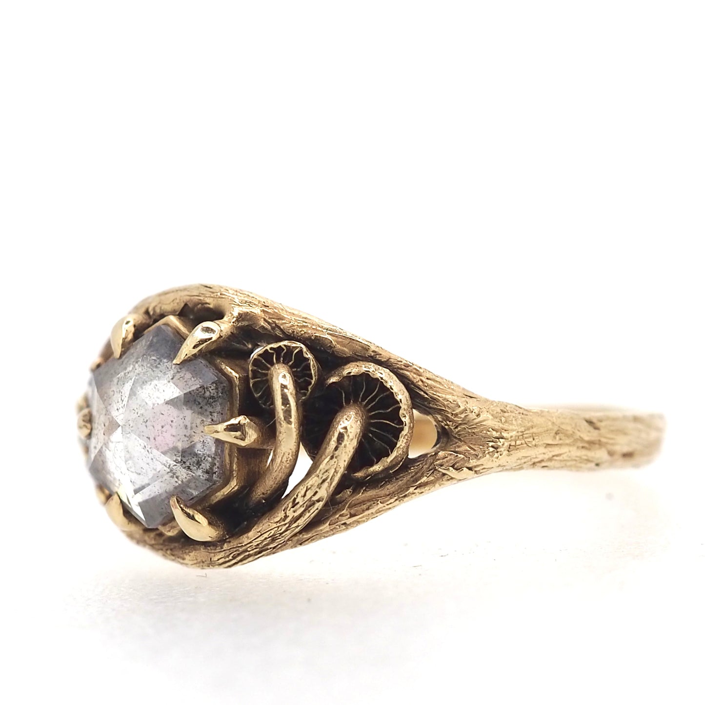 Caldera ring with salt and pepper diamond