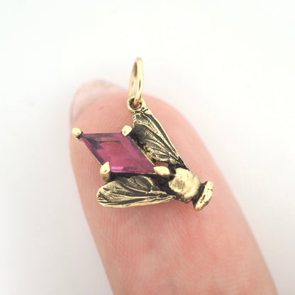 Fly charm with pink sapphire
