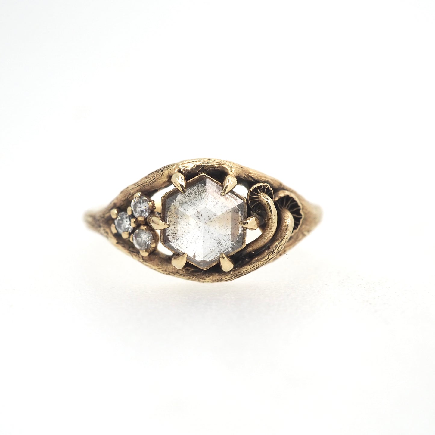 Caldera ring with salt and pepper diamond