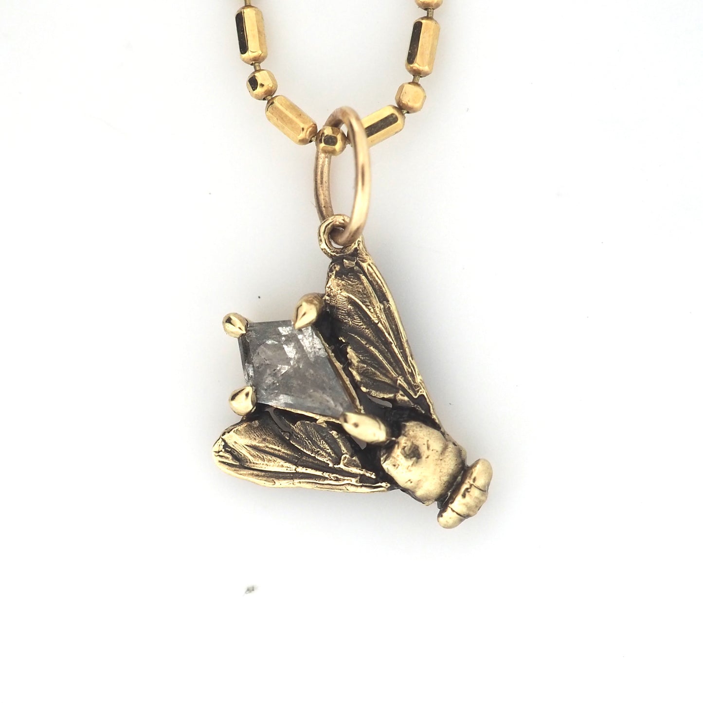 Fly charm with diamond
