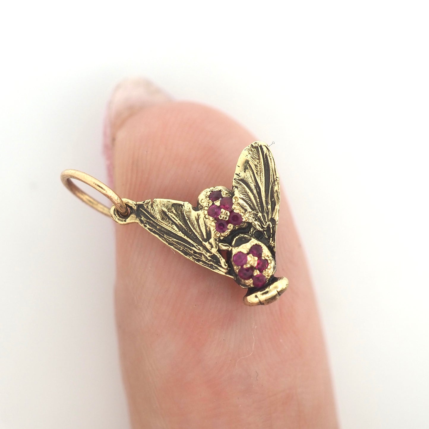 Fly charm with rubies