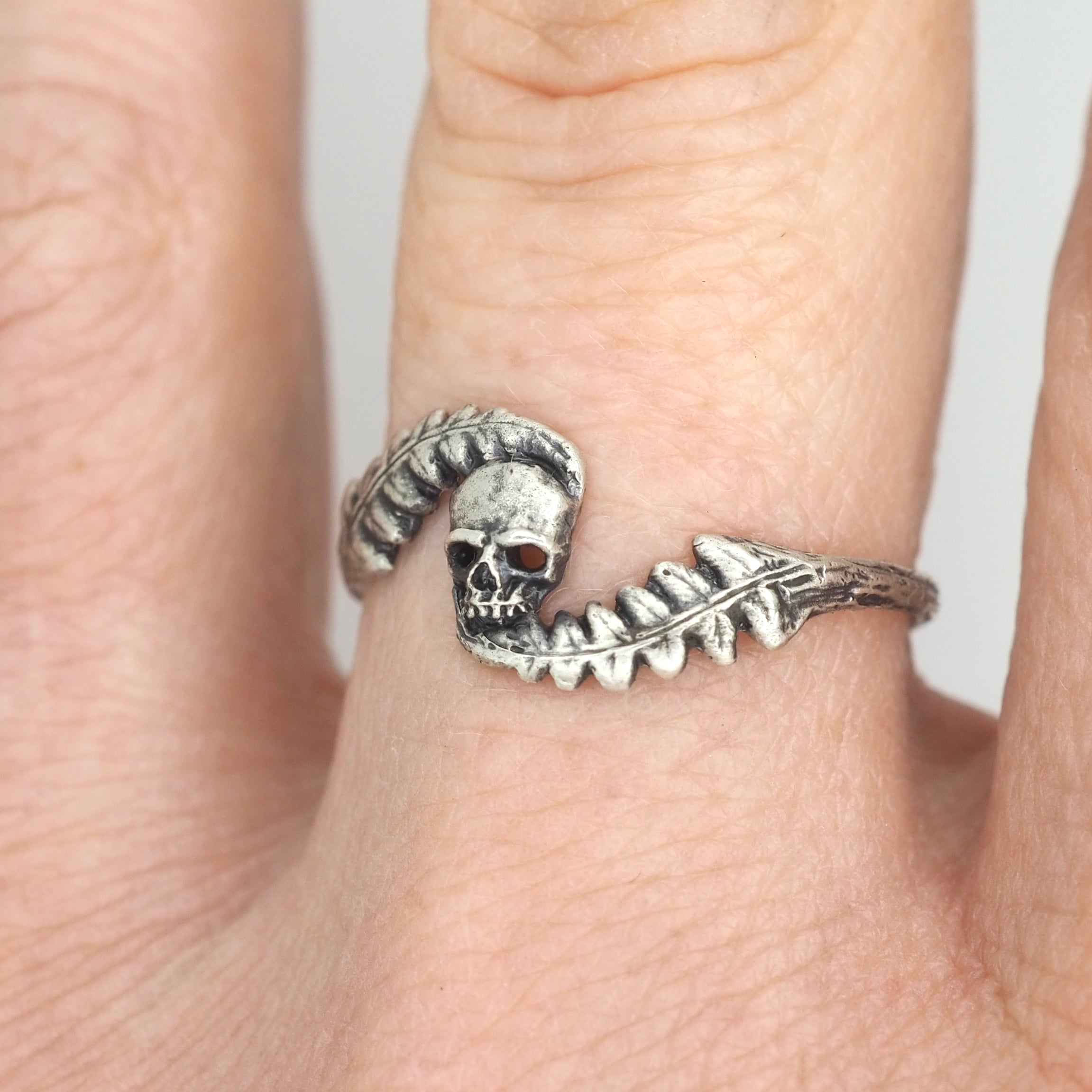 Swirly fern and skull ring