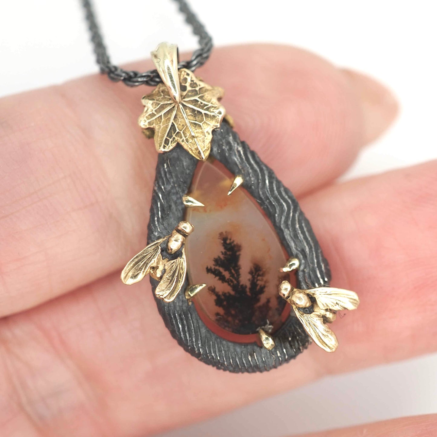 Cinder fly pendant