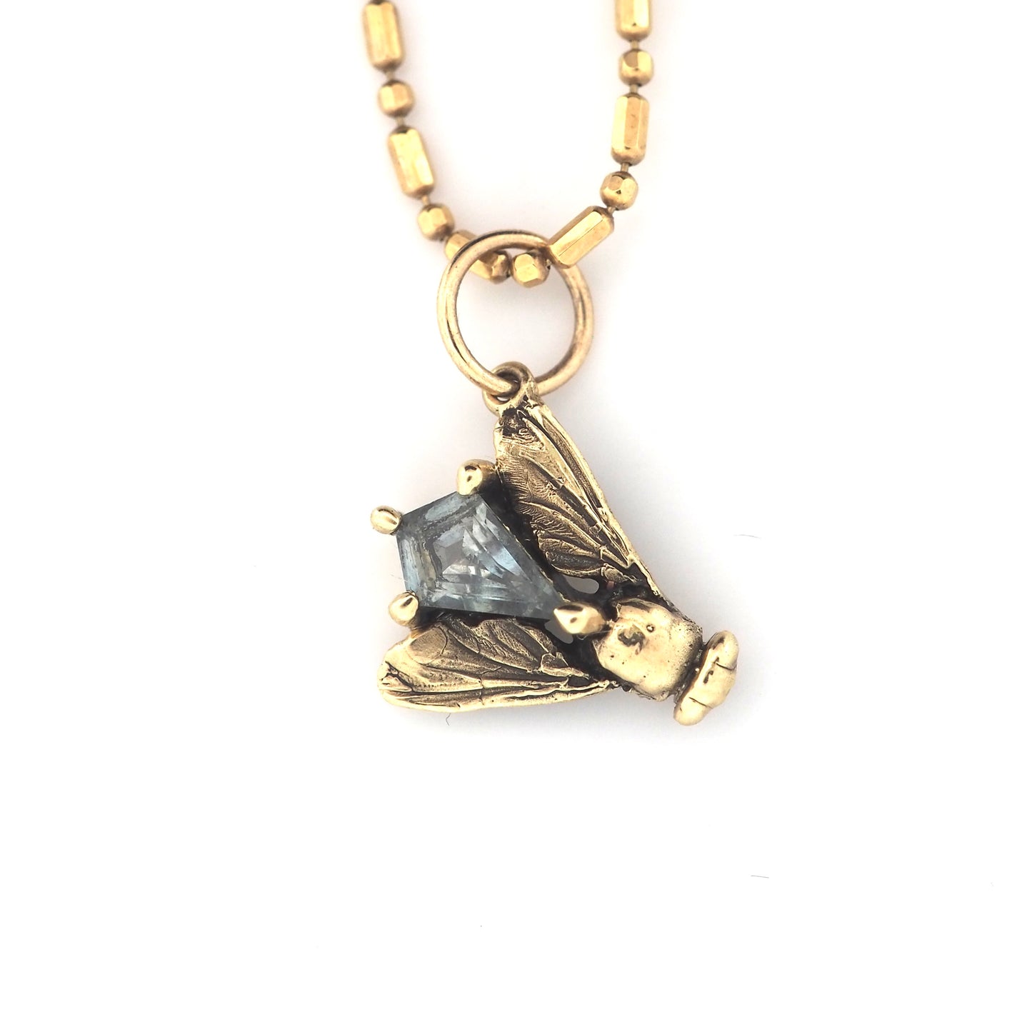 Fly charm with Montana sapphire