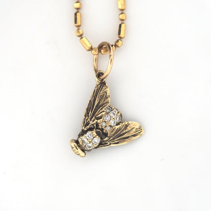 Fly charm with diamonds