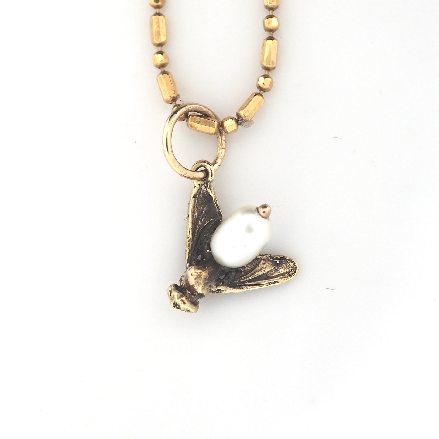 Fly charm with pearl