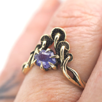 Mushroom peak ring with purple sapphire