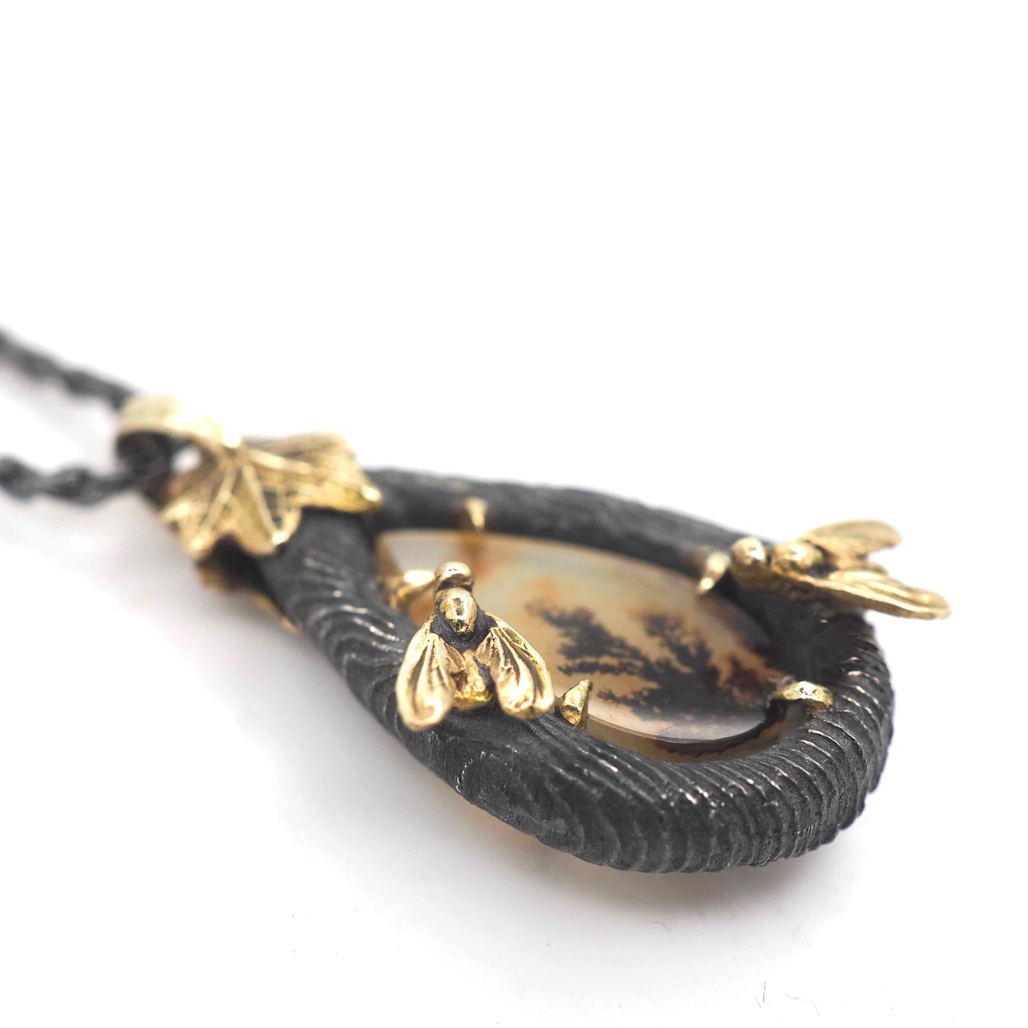 Cinder fly pendant