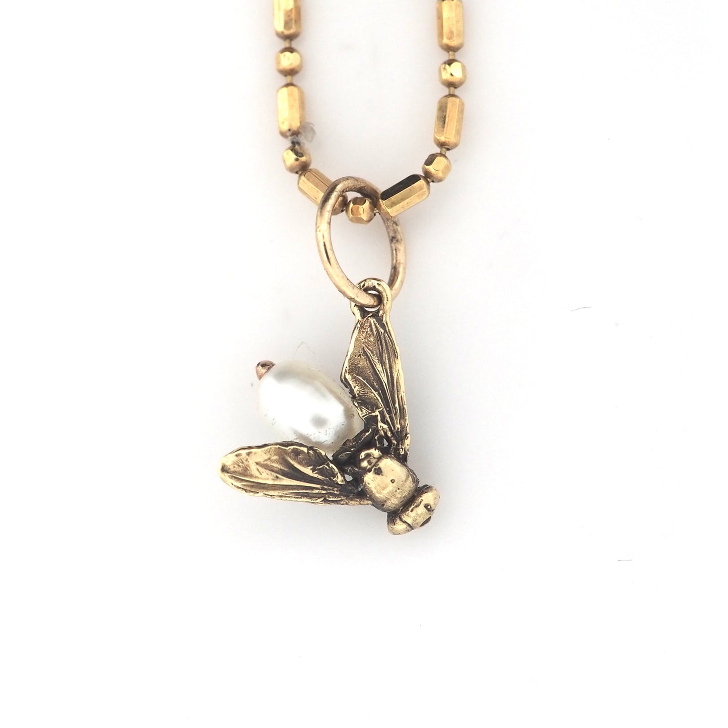 Fly charm with pearl
