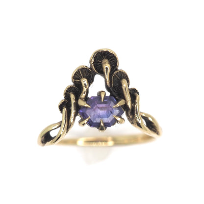 Mushroom peak ring with purple sapphire