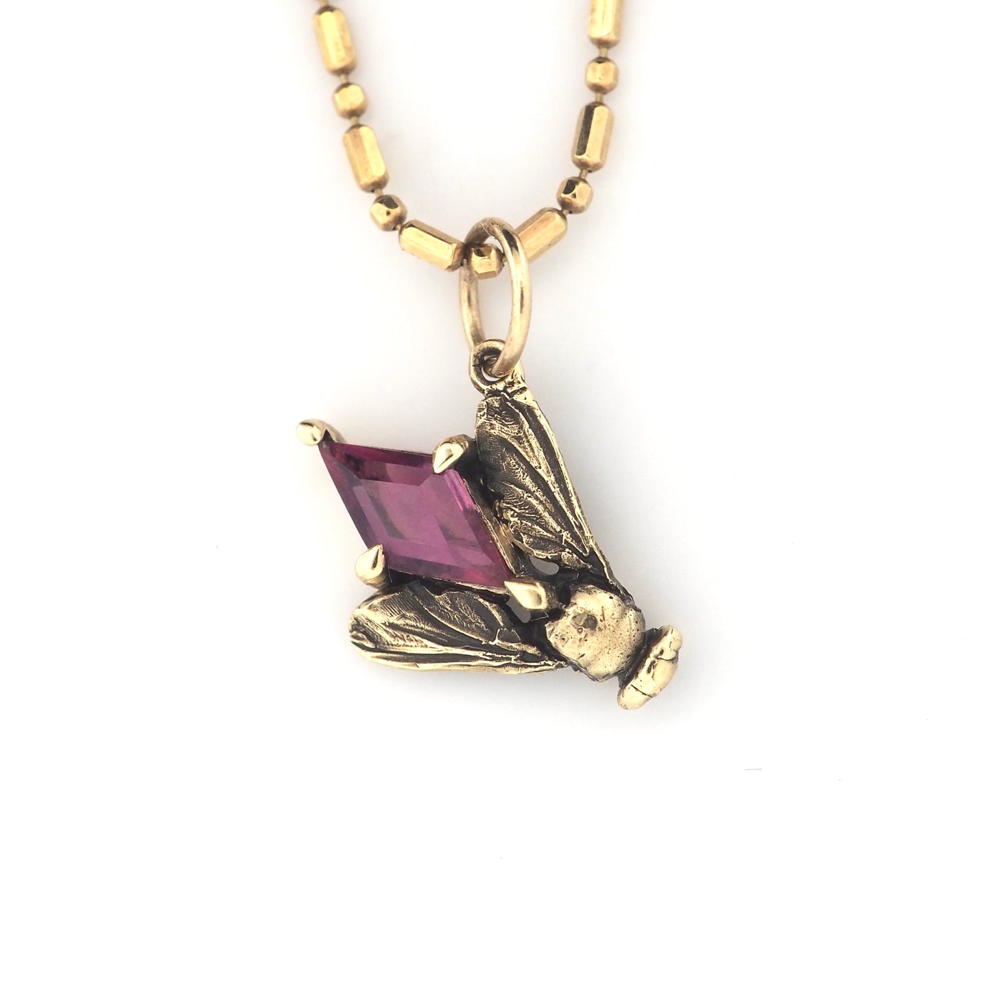 Fly charm with pink sapphire