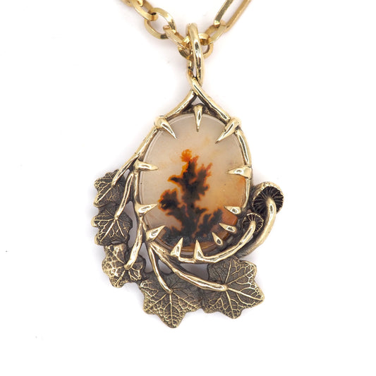 Framed dendritic agate pendant