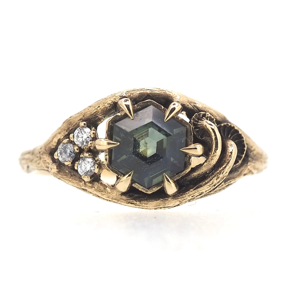 Caldera ring with sapphire and diamonds