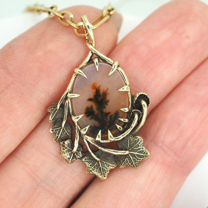 Framed dendritic agate pendant