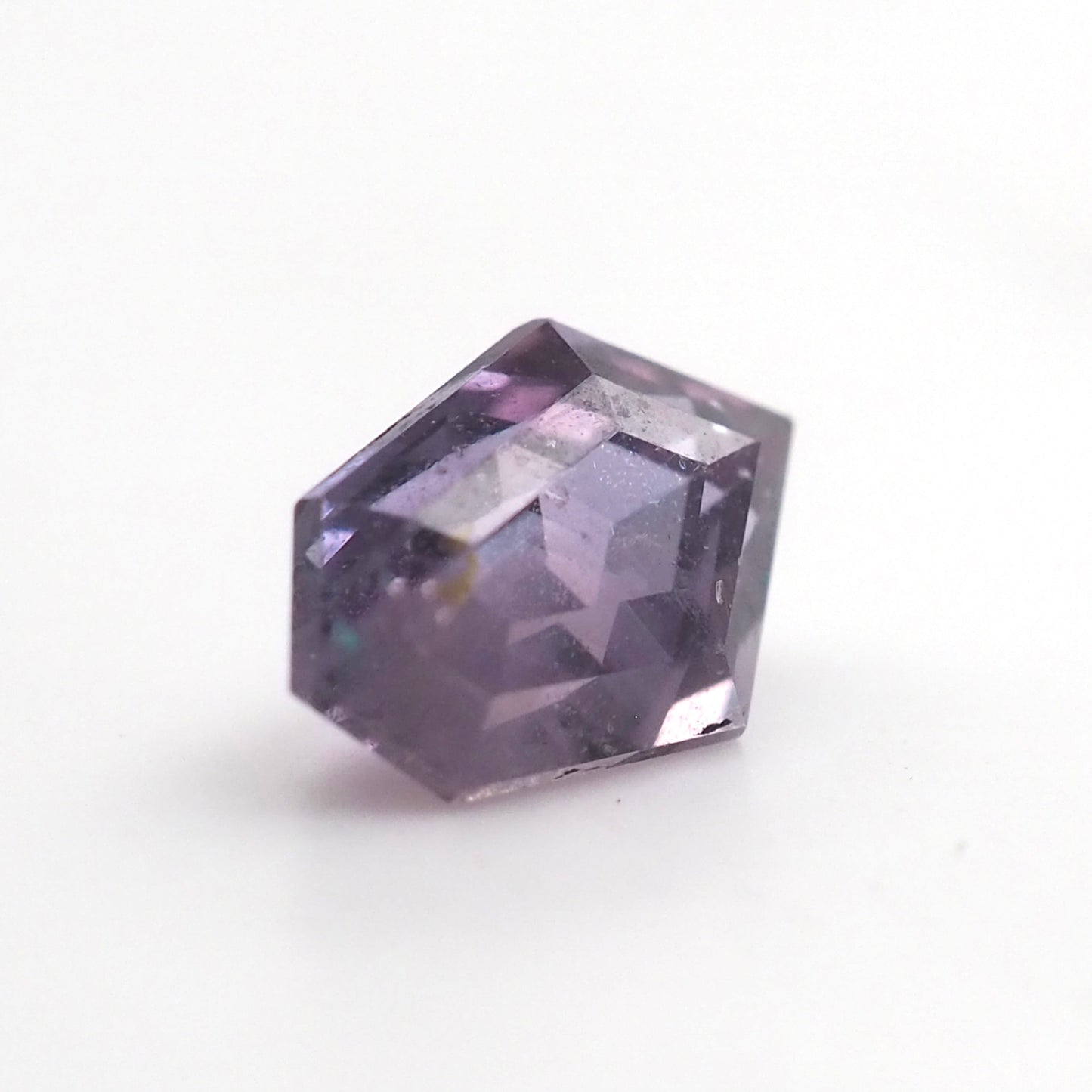 Purple sapphire step cut shield .53 ct