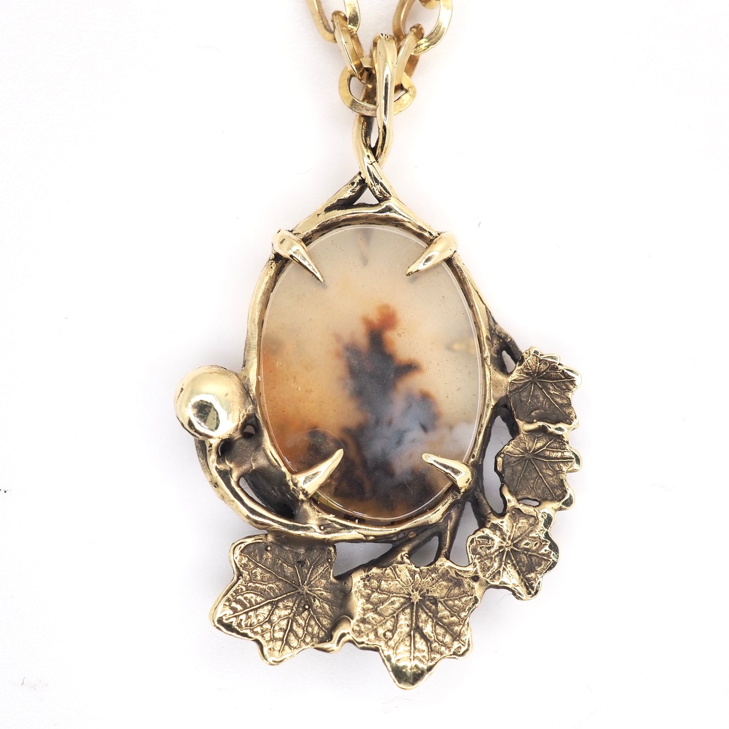 Framed dendritic agate pendant