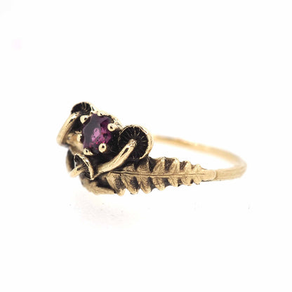 Sisters ring with garnet hexagon