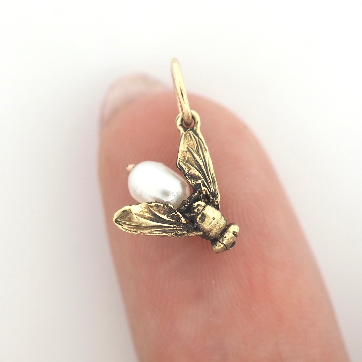 Fly charm with pearl