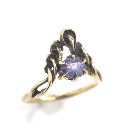 Mushroom peak ring with purple sapphire
