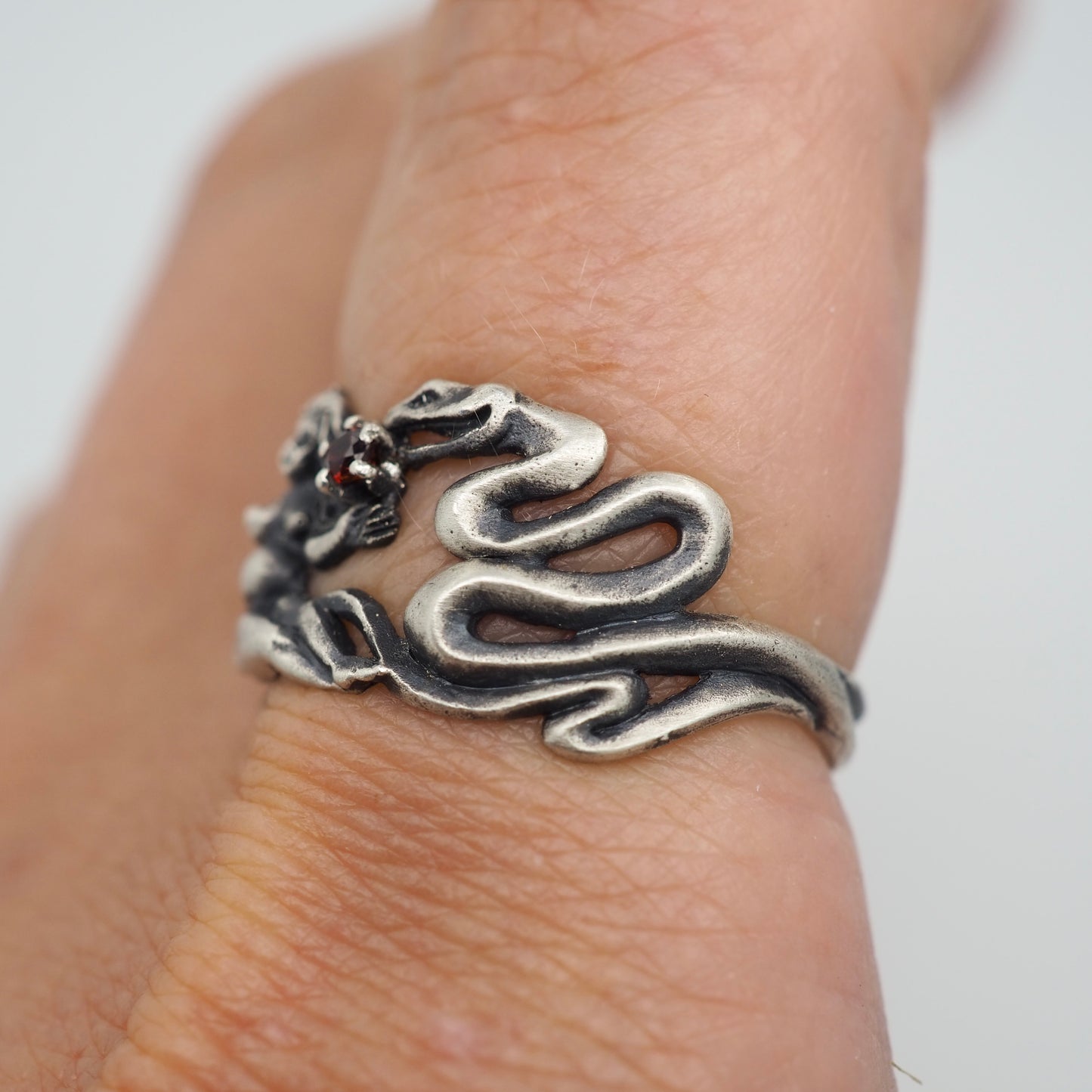 Nudie and the serpent ring