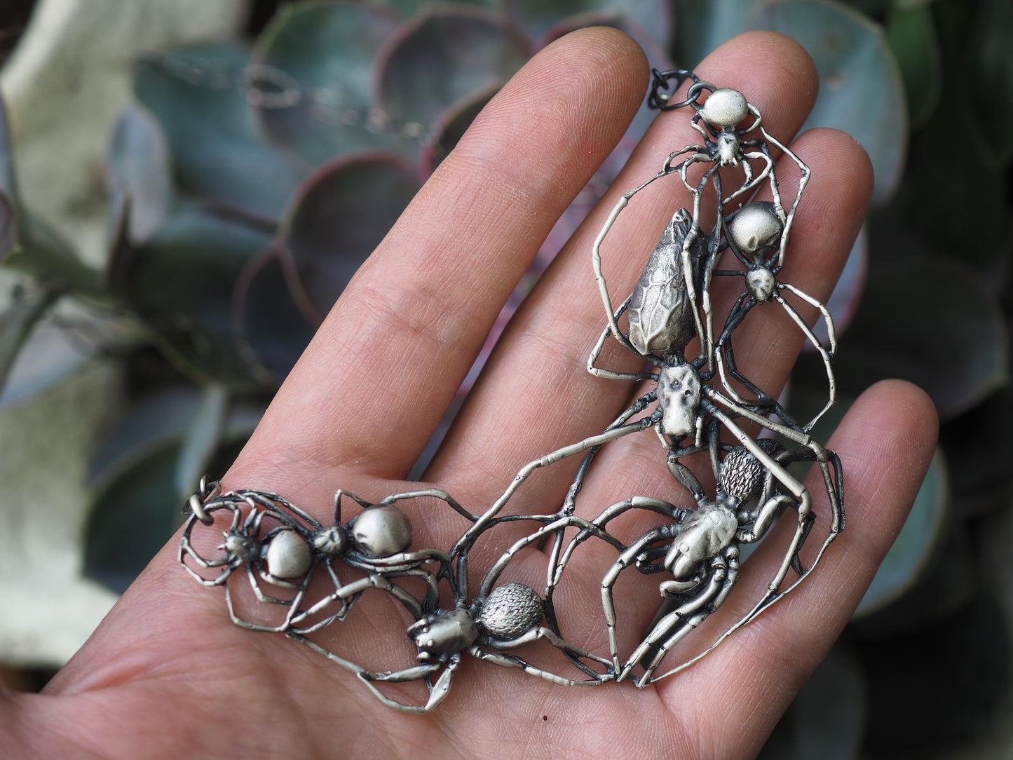 Web of spiders necklace