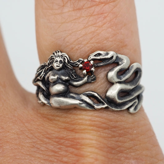 Nudie and the serpent ring