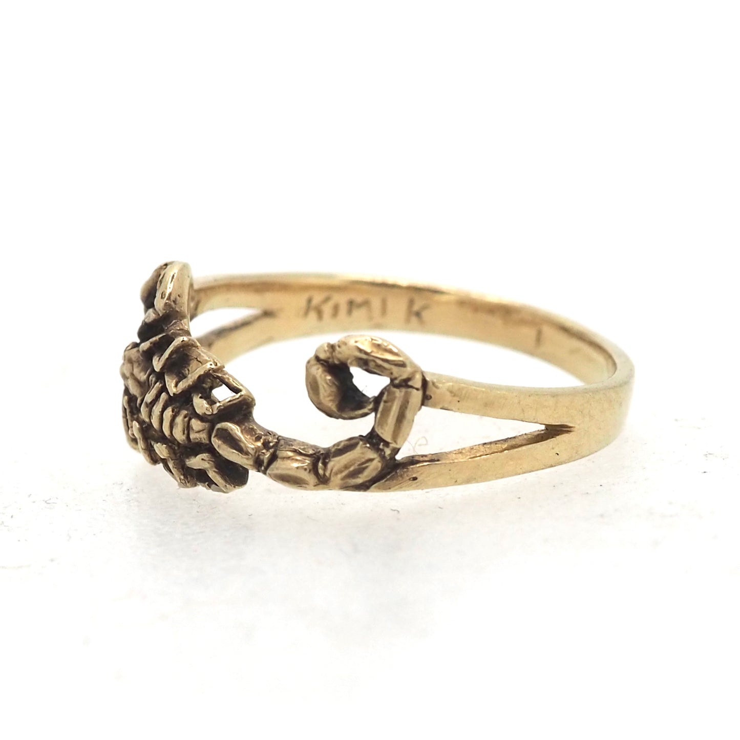Scorpion east west ring gold