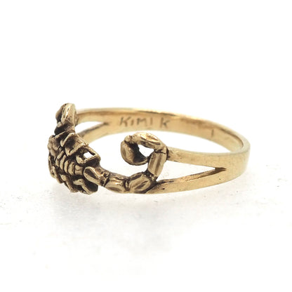 Scorpion east west ring gold