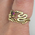 Nudie and the serpent ring