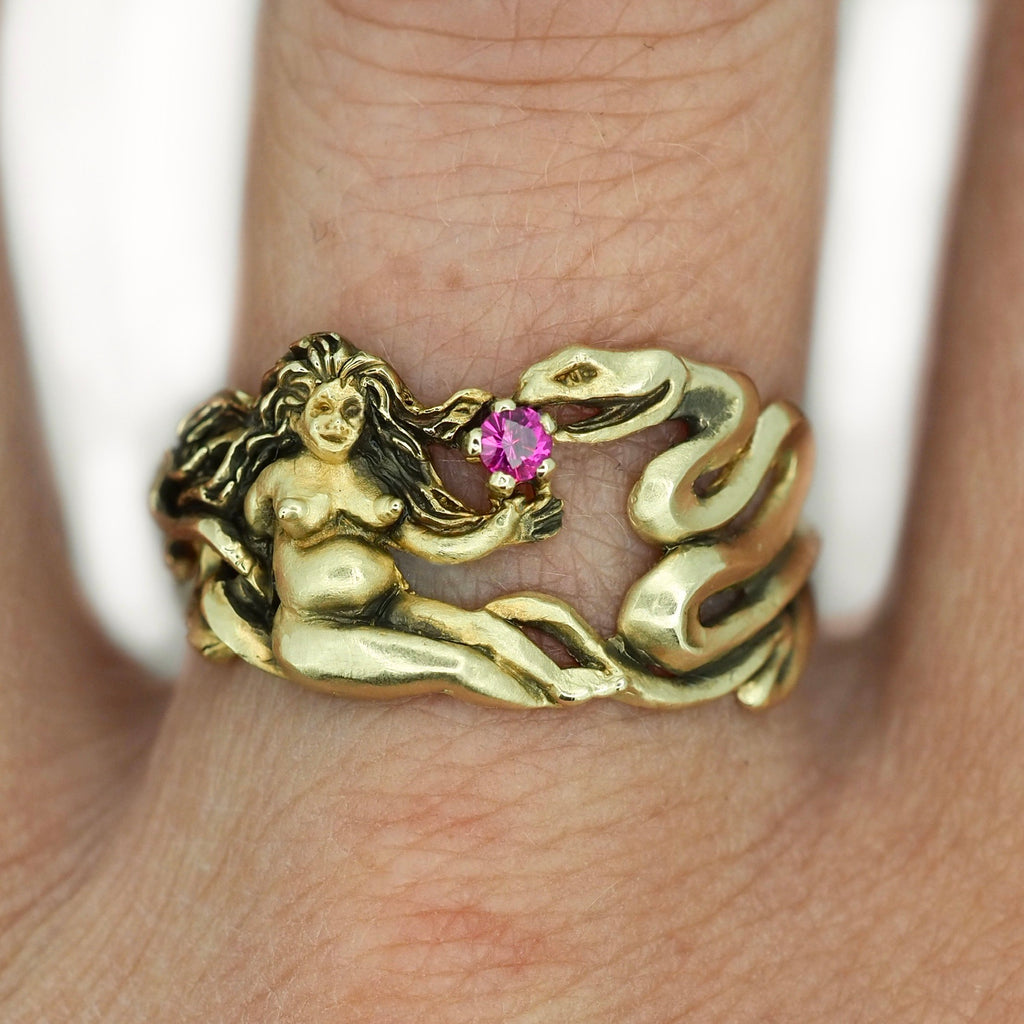 Nudie and the serpent ring