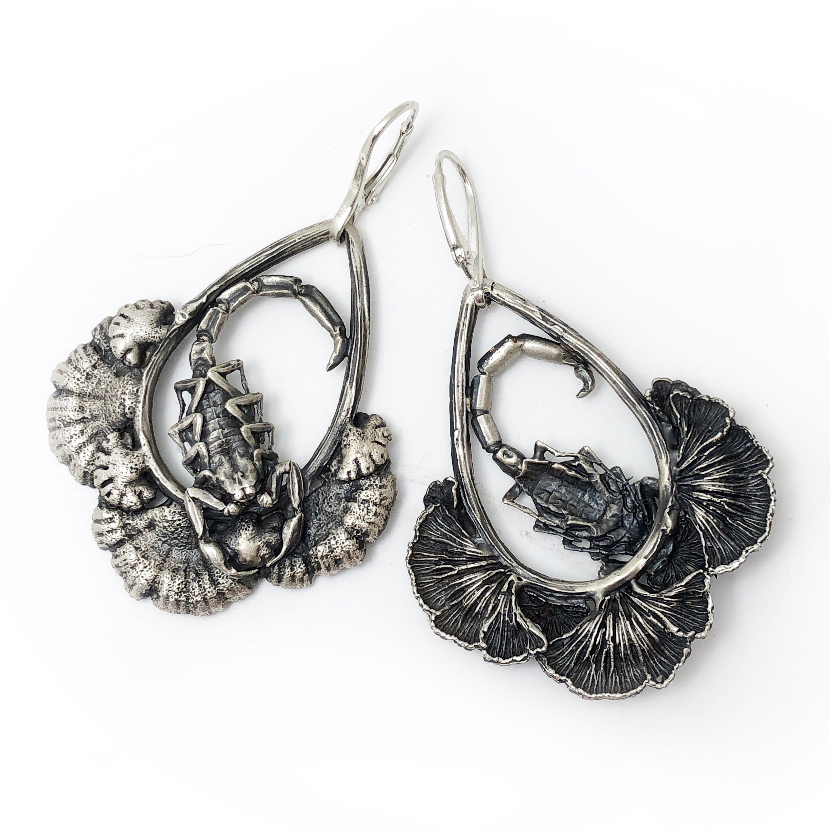 Scorpion and split gill mushroom earrings