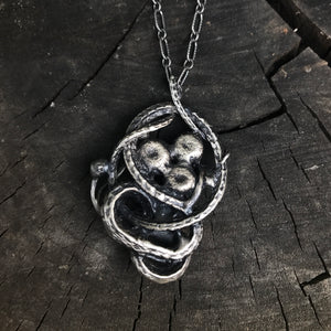 Serpent and mushrooms necklace