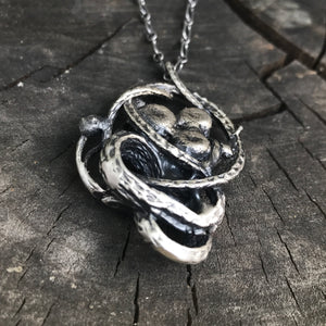 Serpent and mushrooms necklace